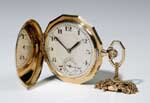 Goldene Herren-Savonette mit Uhrkette.