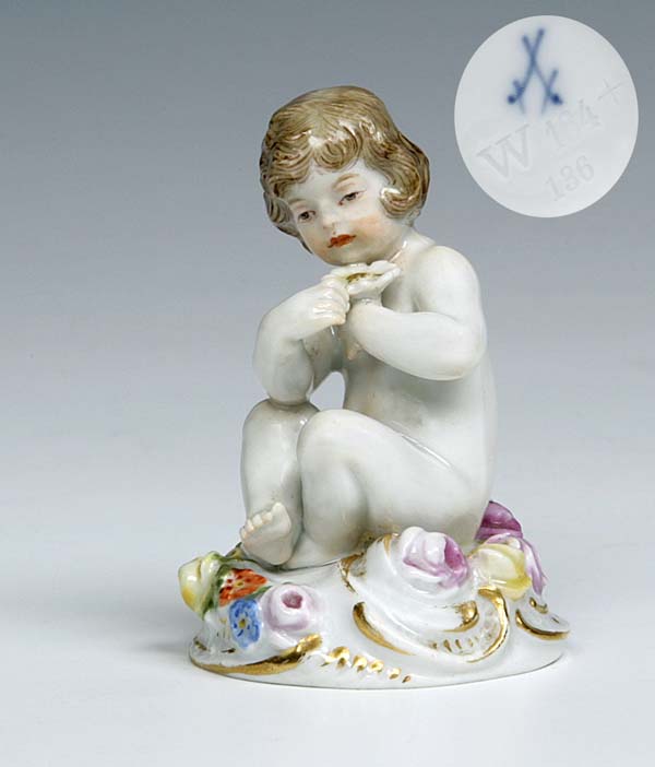 Miniatur-Jugendstil-Figur.