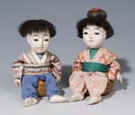 Paar asiatische Puppen.