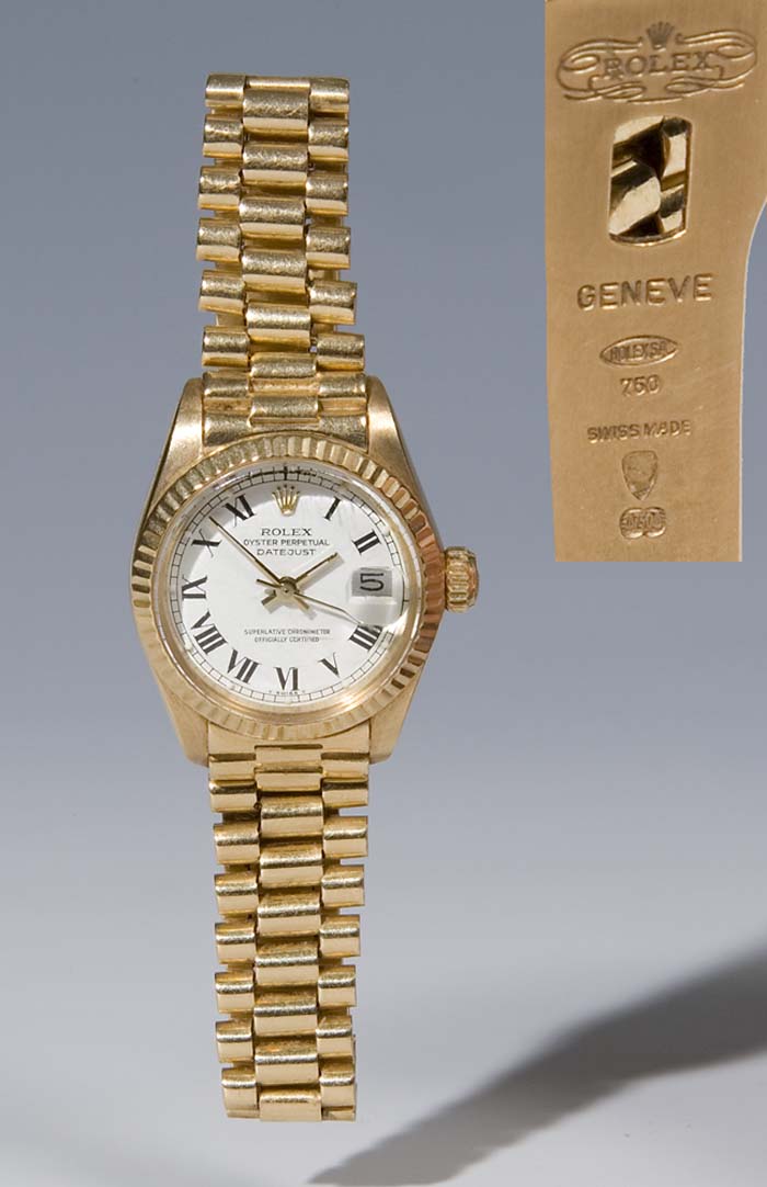 Goldene Damen-Armbanduhr.
